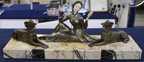 A spelter and marble Art Deco style figure signed Mollins on stand